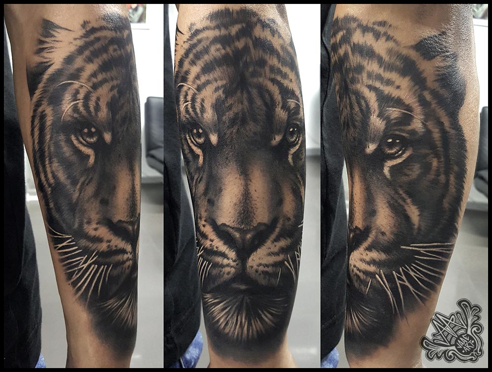 tigre-brazo-realista